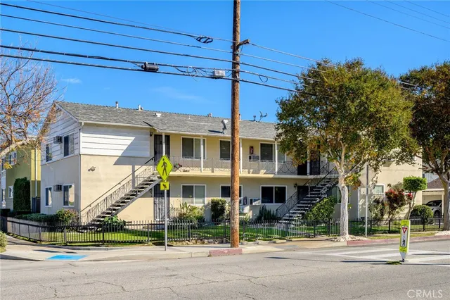a view of a building with a street