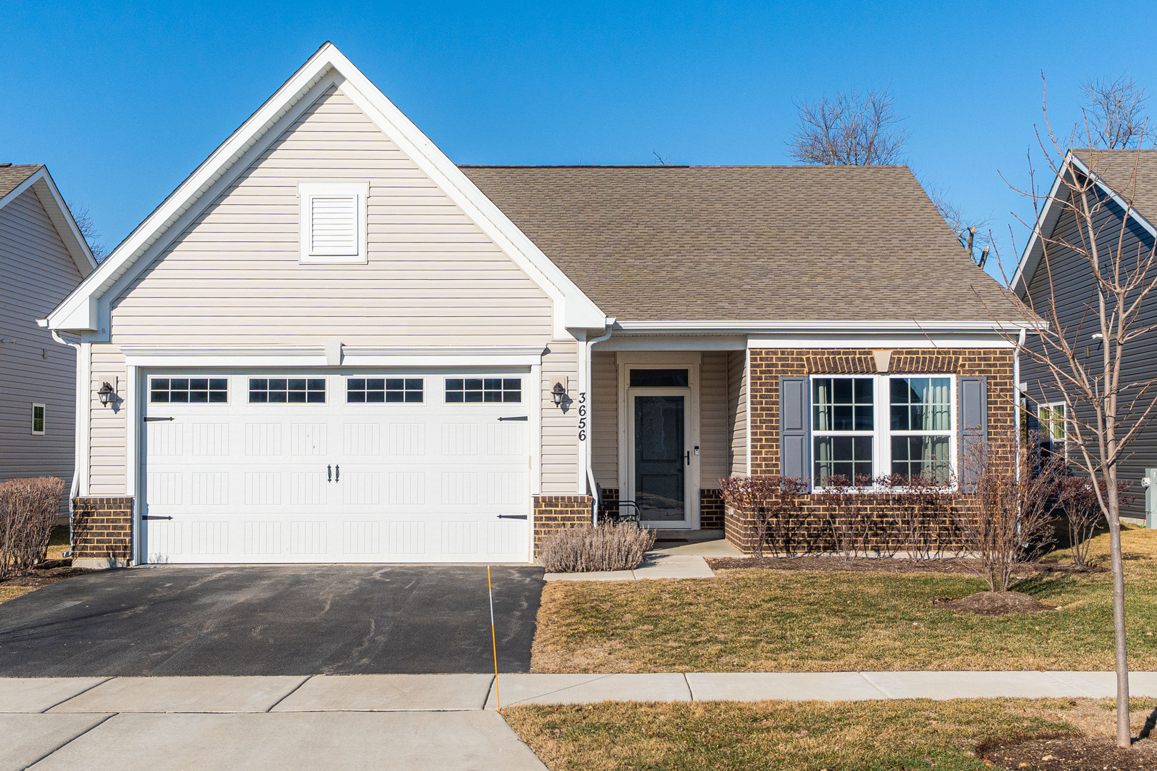 3656 Reddington Circle Elgin, IL 60124 - Photo 1 of 35 a front view of a house with a yard