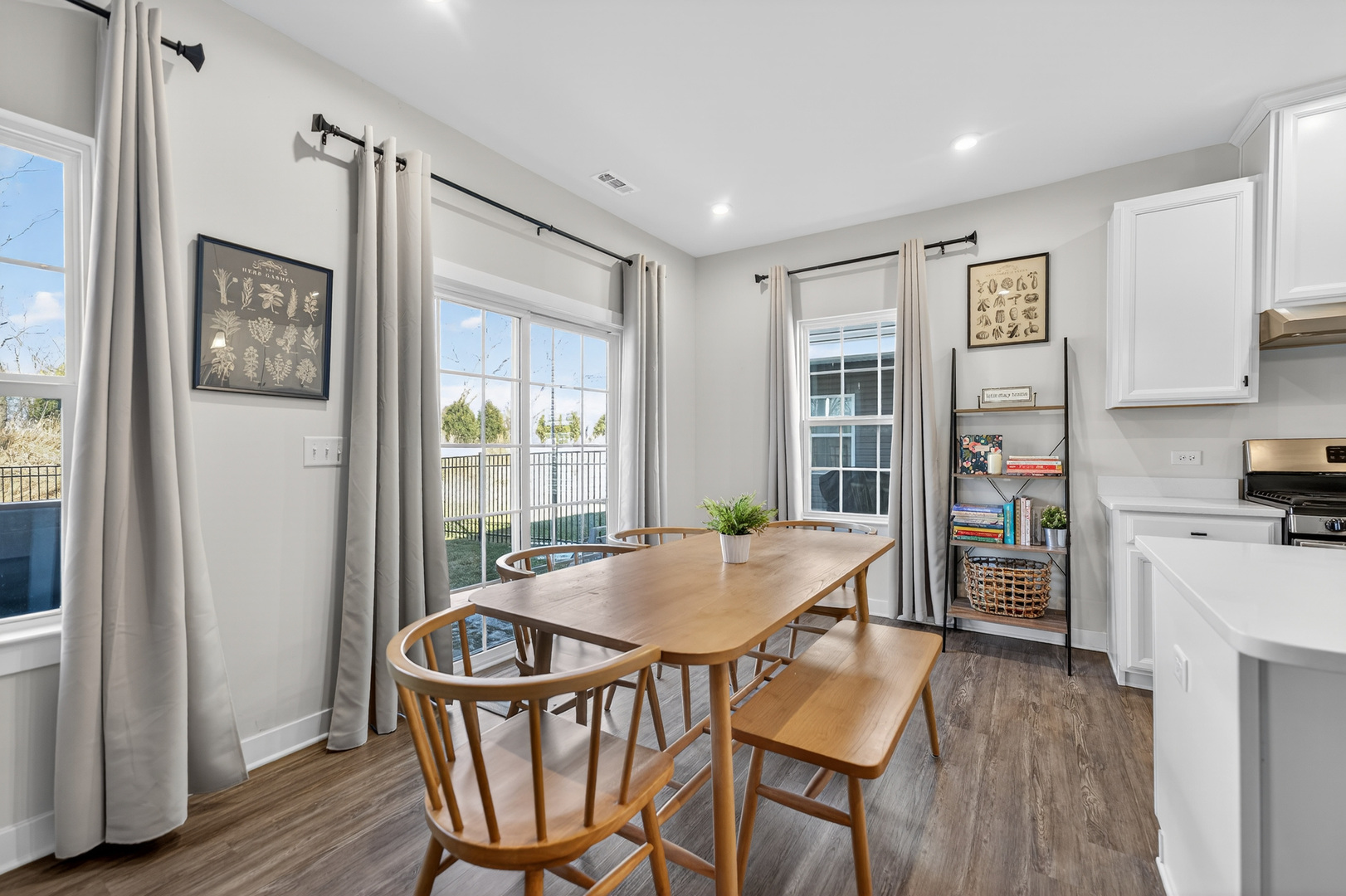 3656 Reddington Circle Elgin, IL 60124 - Photo 15 of 35 a view of a dining room with furniture window and wooden floor