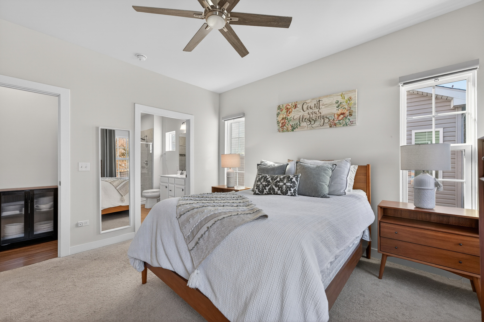 3656 Reddington Circle Elgin, IL 60124 - Photo 20 of 35 a bedroom with a bed and a chandelier