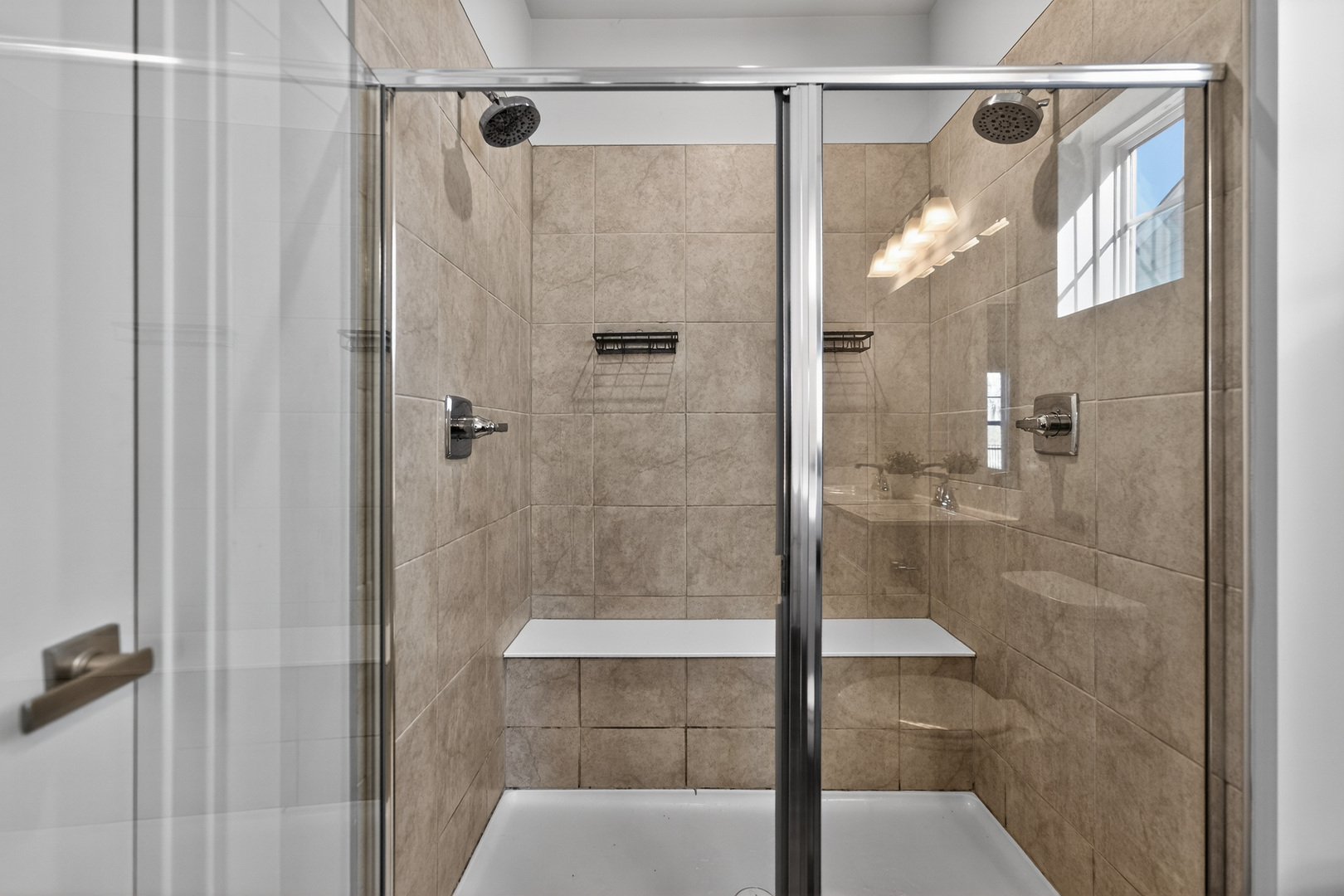 3656 Reddington Circle Elgin, IL 60124 - Photo 22 of 35 a bathroom with a glass shower door