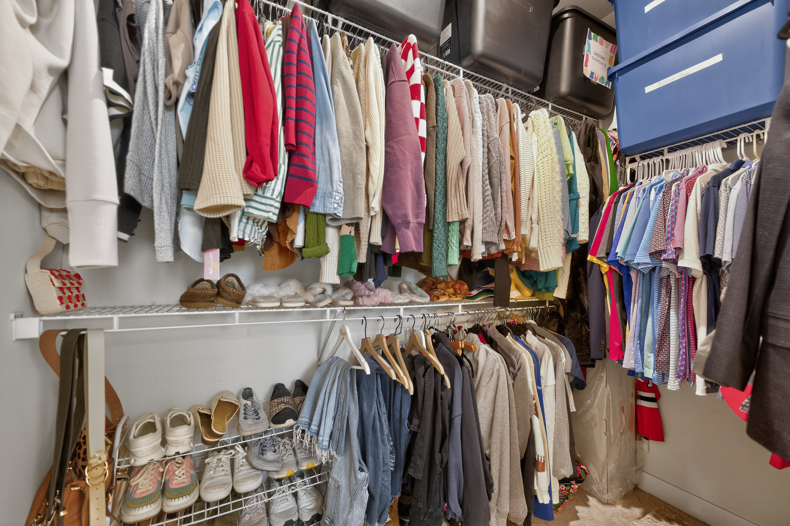 3656 Reddington Circle Elgin, IL 60124 - Photo 23 of 35 a view of walk in closet with clothes and shoes