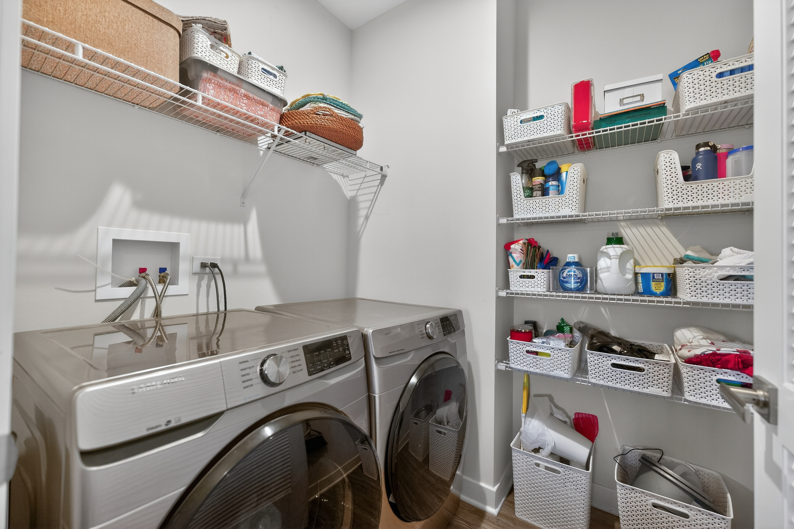 3656 Reddington Circle Elgin, IL 60124 - Photo 29 of 35 a utility room with dryer washer and shoe rack