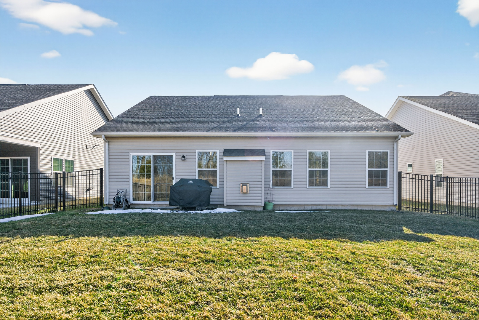 3656 Reddington Circle Elgin, IL 60124 - Photo 32 of 35 a front view of a house with a yard