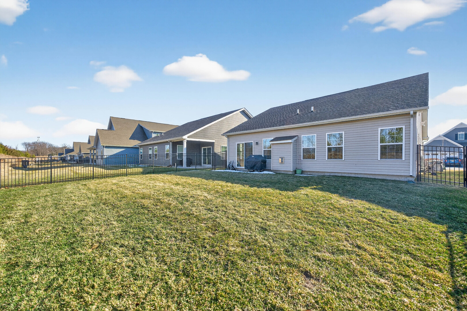 3656 Reddington Circle Elgin, IL 60124 - Photo 33 of 35 a view of a house with a backyard