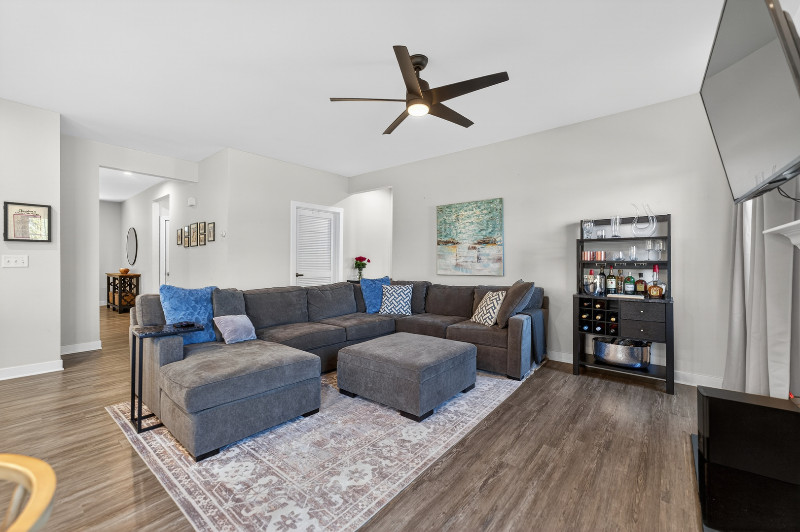 3656 Reddington Circle Elgin, IL 60124 - Photo 7 of 35 a living room with furniture and wooden floor