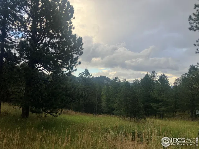 a view of lake with green space