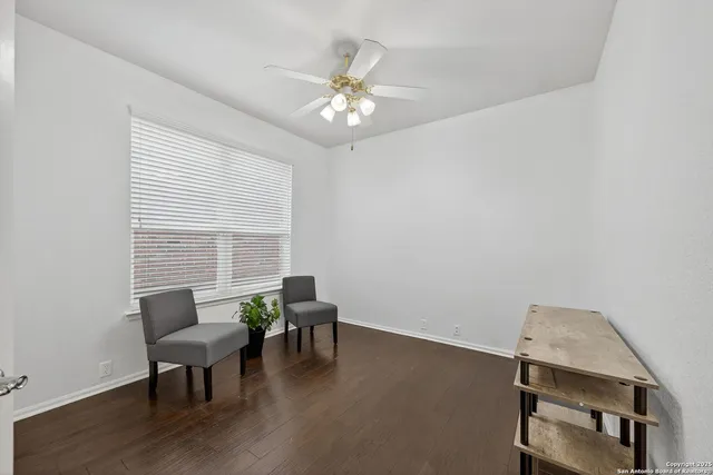 a workspace with furniture and window