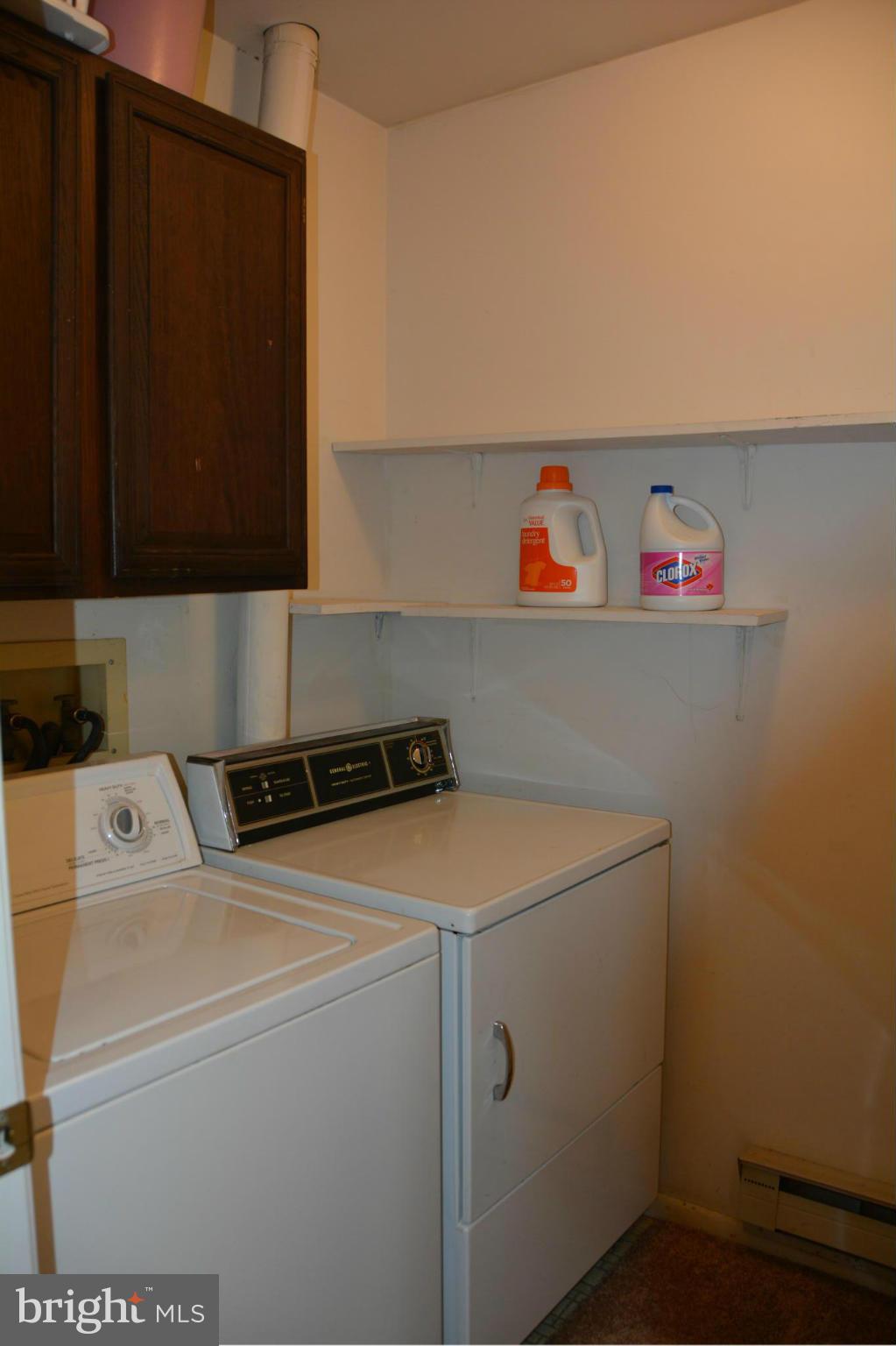 7004 Basswood Road Frederick, MD 21703 - Photo 14 of 16 a utility room with dryer and washer
