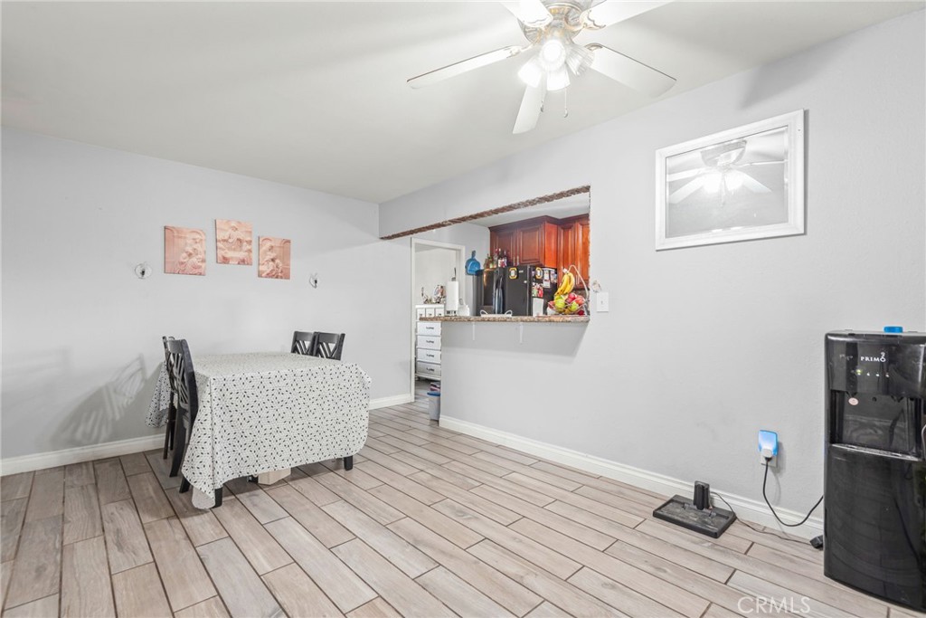 19450 Woodhill Street Rialto, CA 92376 - Photo 17 of 51 a living room with furniture and a rug
