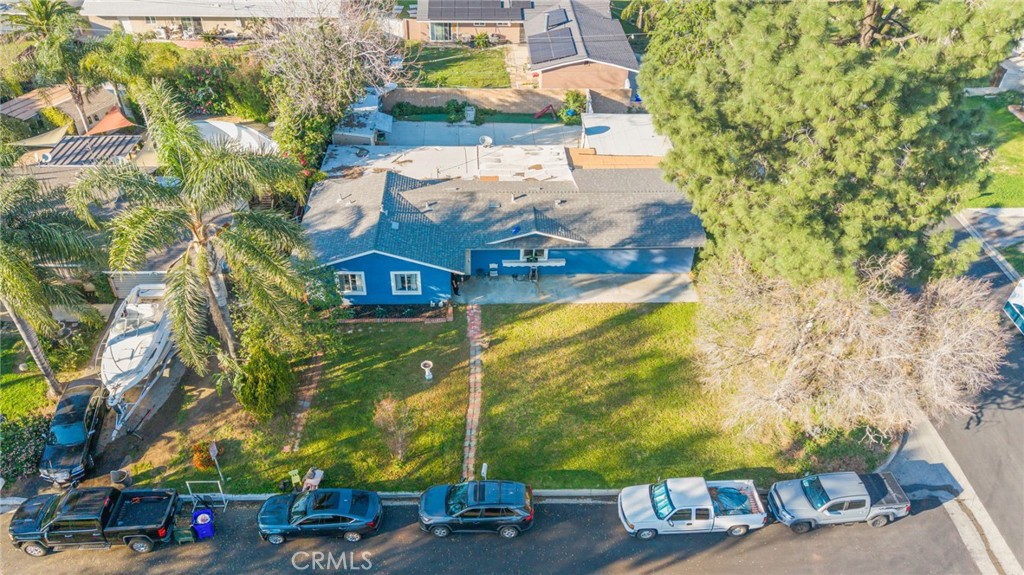 19450 Woodhill Street Rialto, CA 92376 - Photo 43 of 51 a view of houses with yard