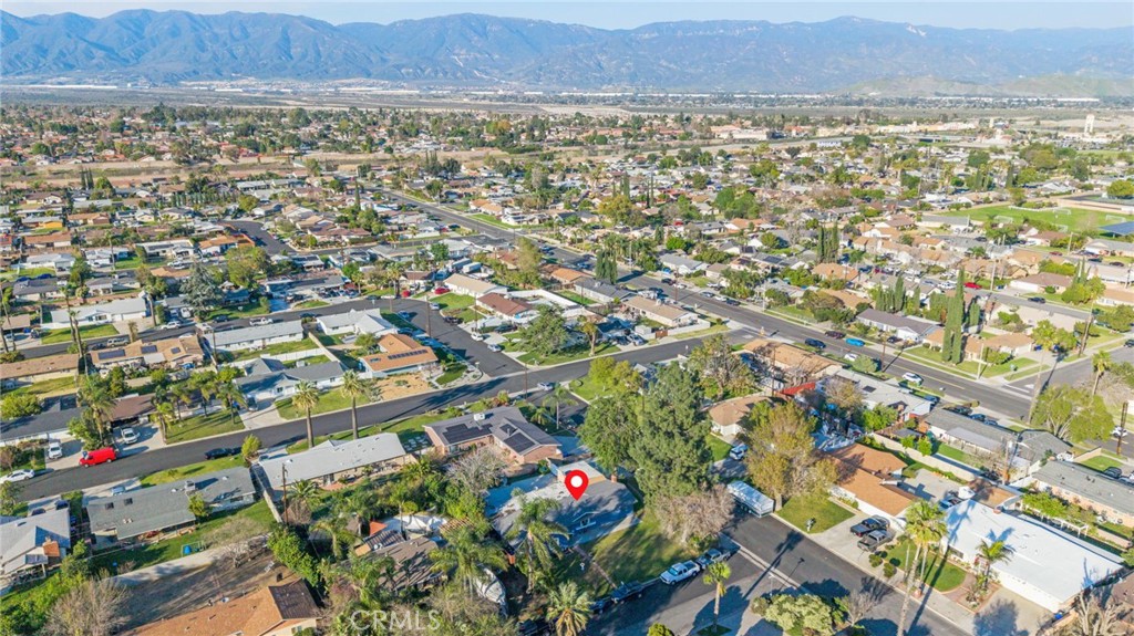 19450 Woodhill Street Rialto, CA 92376 - Photo 46 of 51 an aerial view of residential building and green space