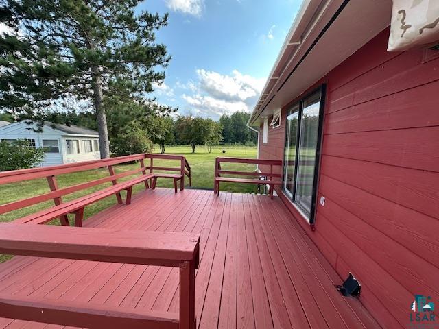 30 Fir Circle Babbitt, MN 55706 - Photo 25 of 27 Deck featuring a lawn