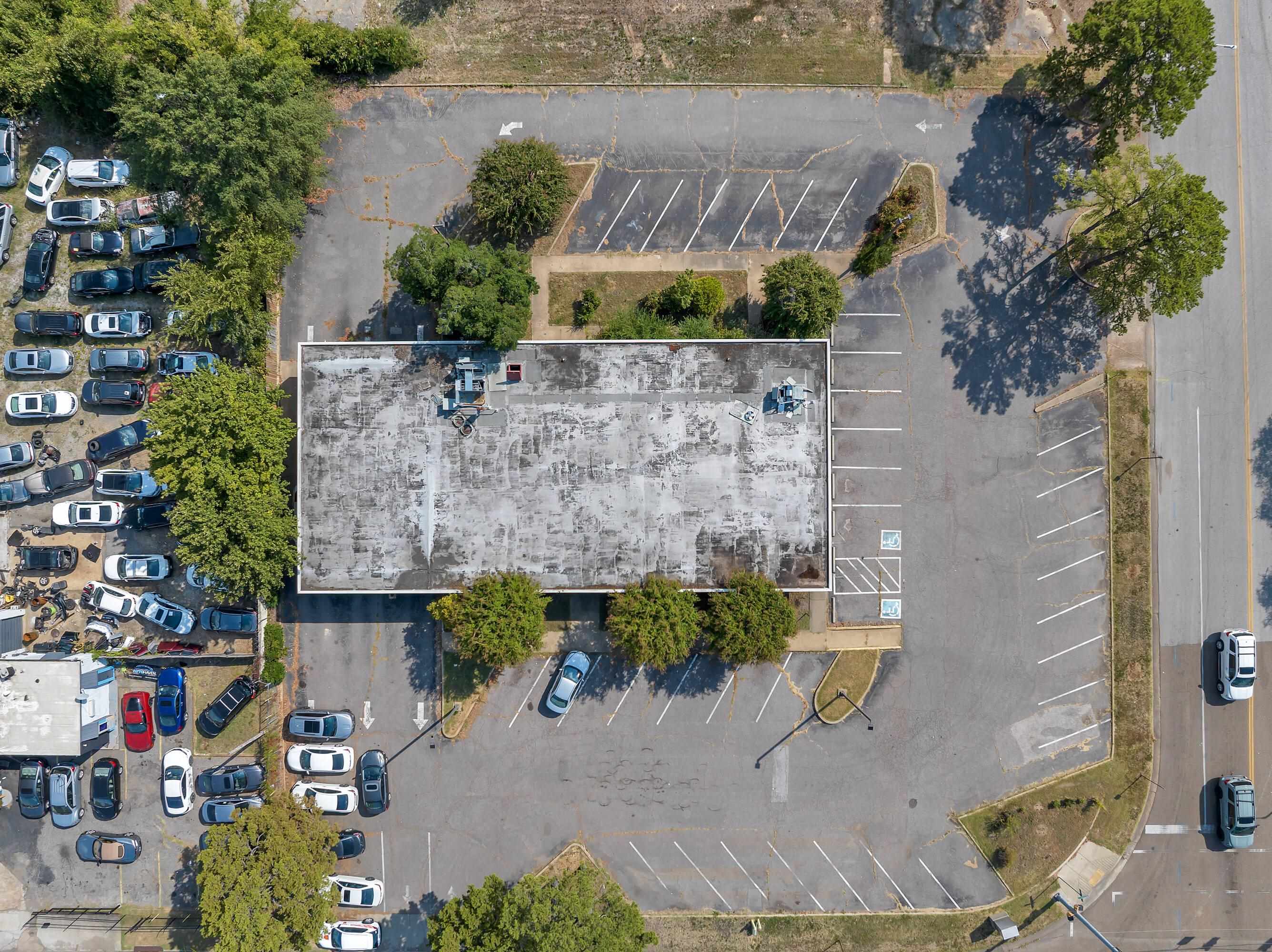 2015 East Brooks Road Memphis, TN 38116 - Photo 3 of 5 an aerial view of a house with a yard and large tree