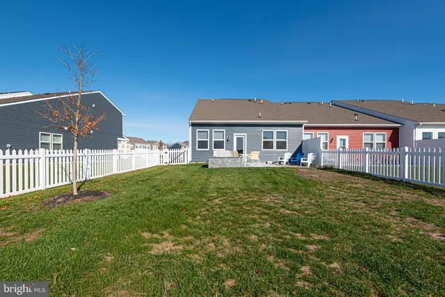 a bathroom with a sink a mirror and vanity