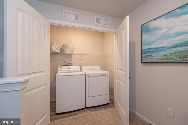 an aerial view of a house with a ocean view