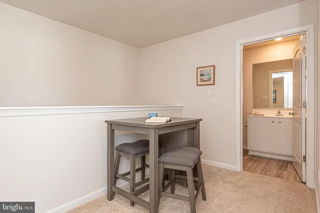 an aerial view of a house with a lake view