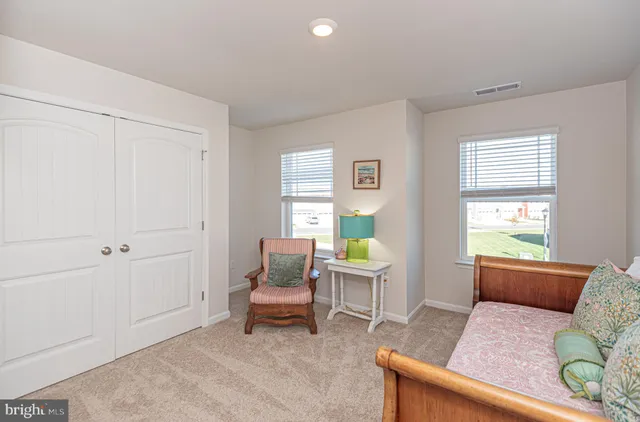 an aerial view of a house with a swimming pool and outdoor view