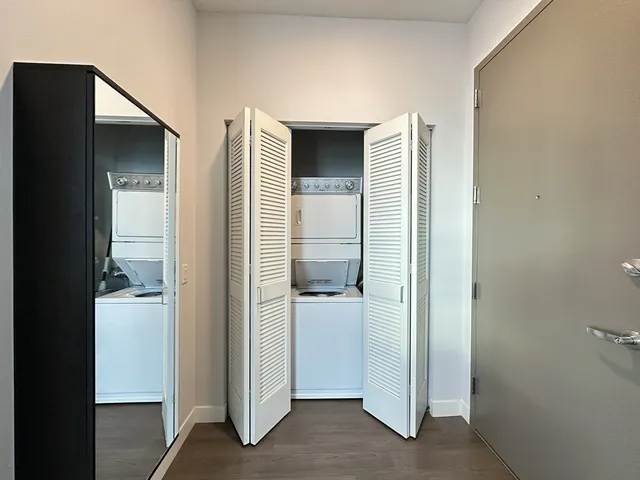 a room with furniture and wooden floor