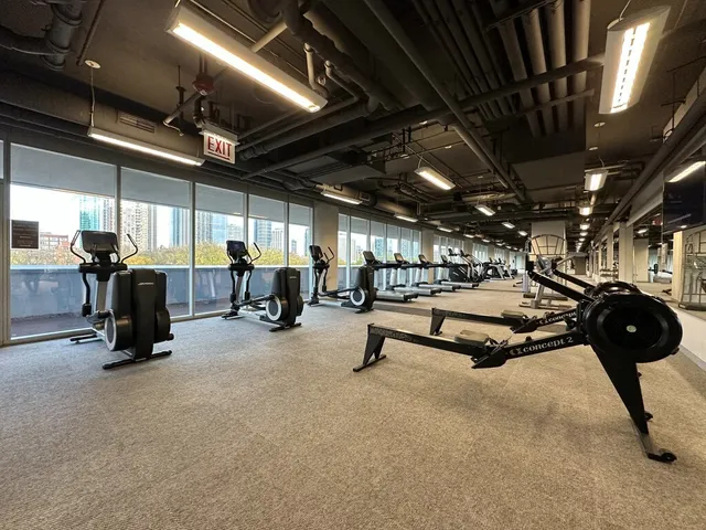 a view of a living room and kitchen