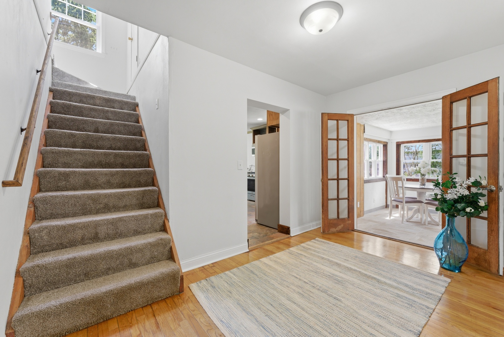 2405 31st Street Moline, IL 61265 - Photo 5 of 24 a view of an empty room with wooden floor and windows