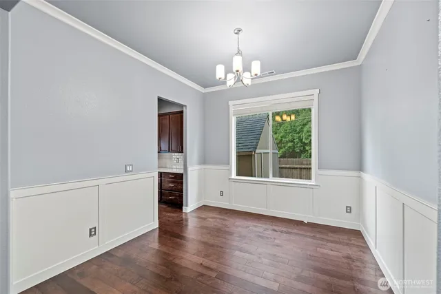 a utility room with a sink washer and dryer