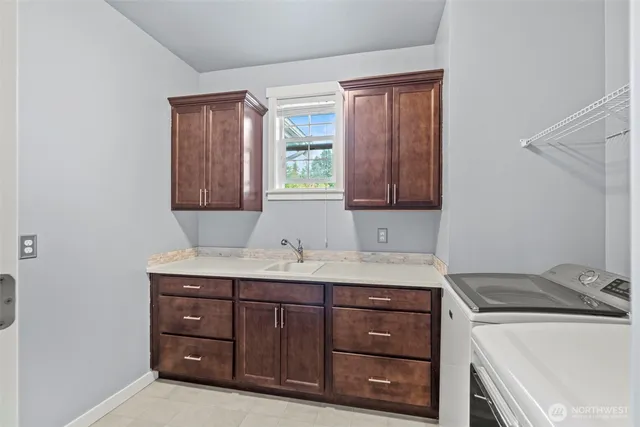 a view of an empty room with a fireplace