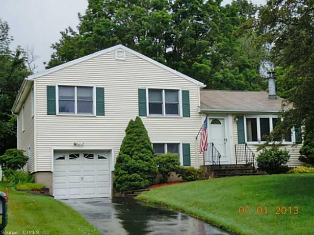 a view of a yard in front of house