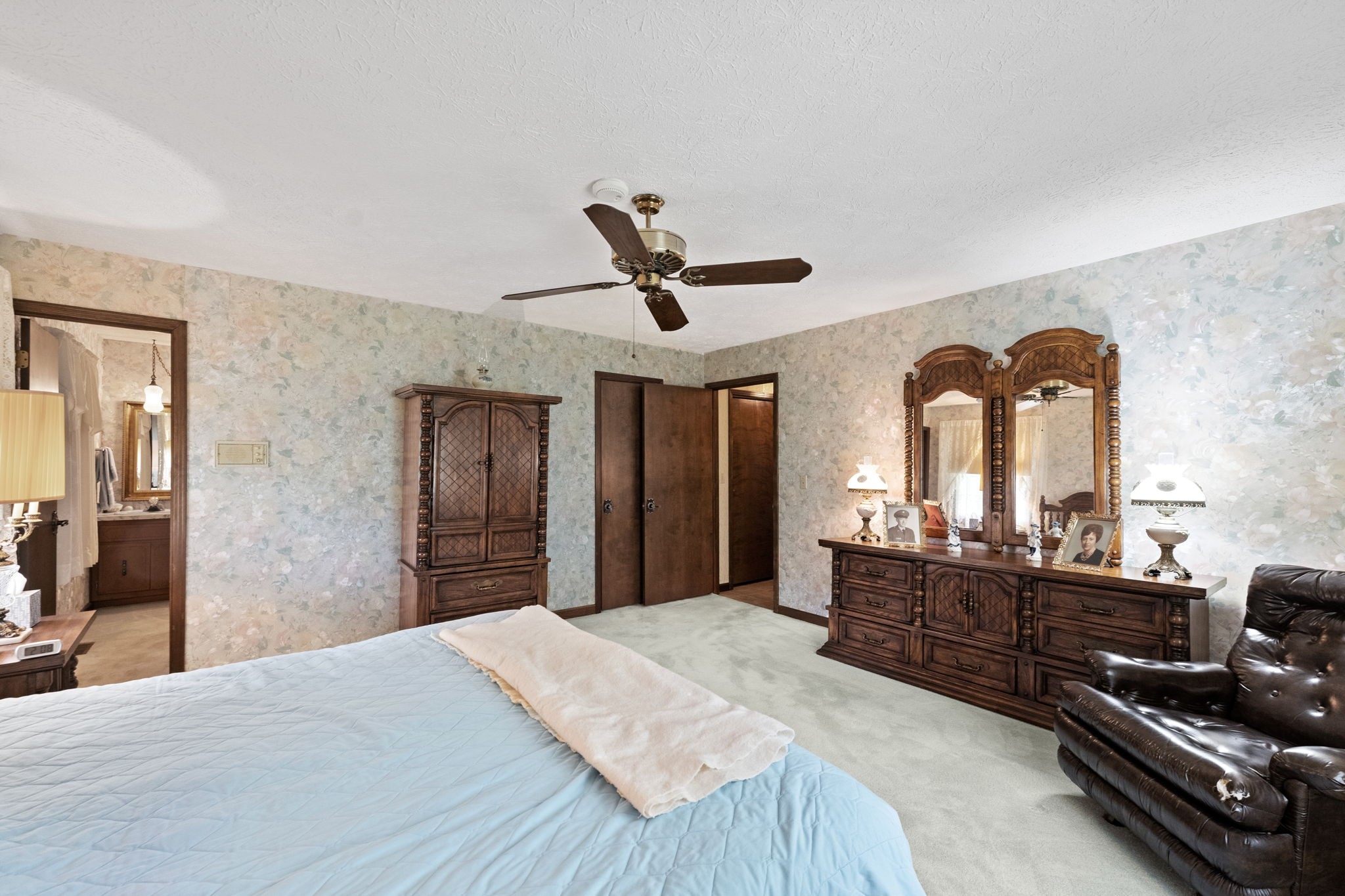 141 Jernigan Road Portland, TN 37148 - Photo 21 of 24 a bedroom with a bed and a dresser
