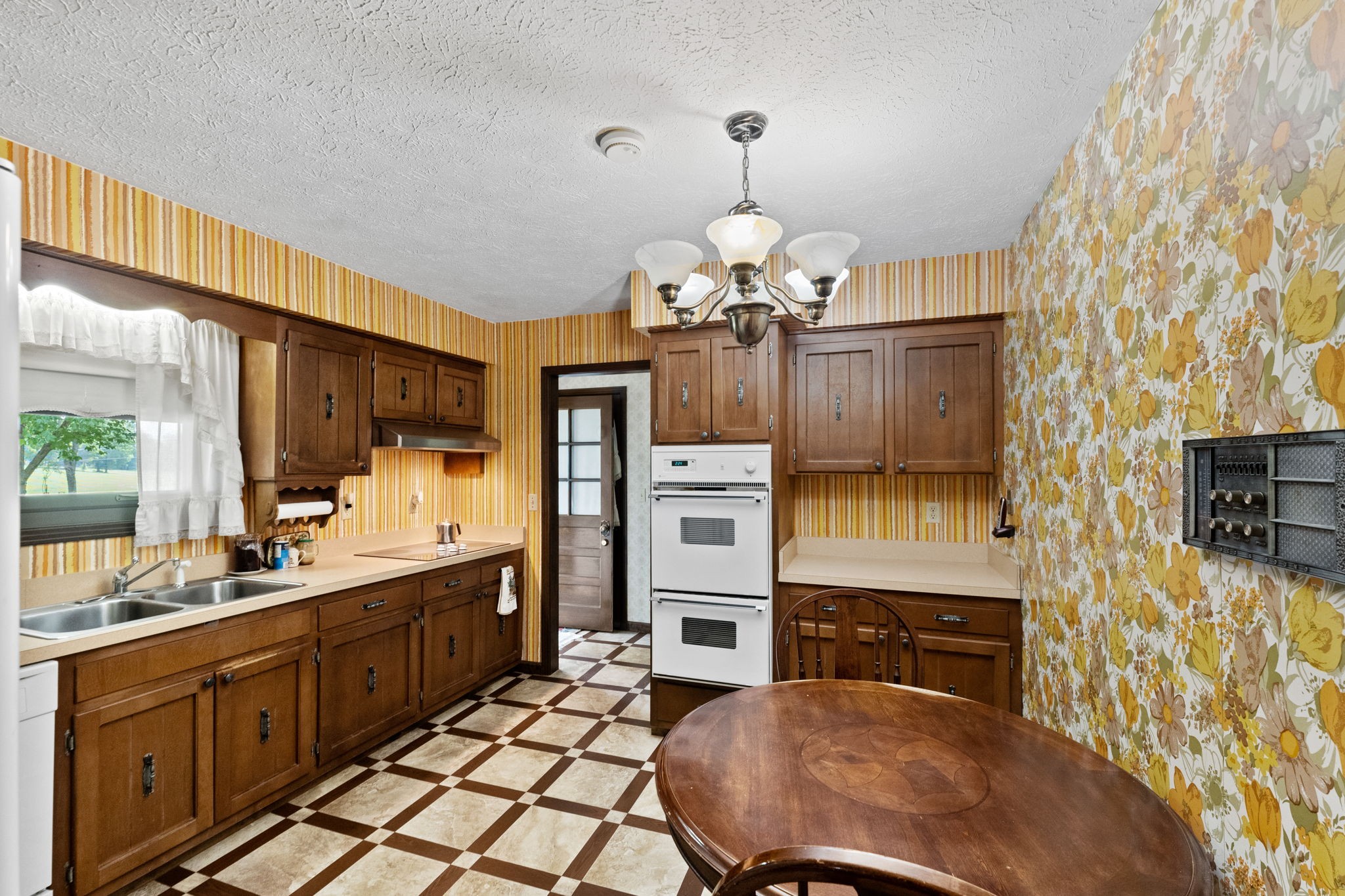 141 Jernigan Road Portland, TN 37148 - Photo 22 of 24 a large kitchen with sink cabinets and appliances