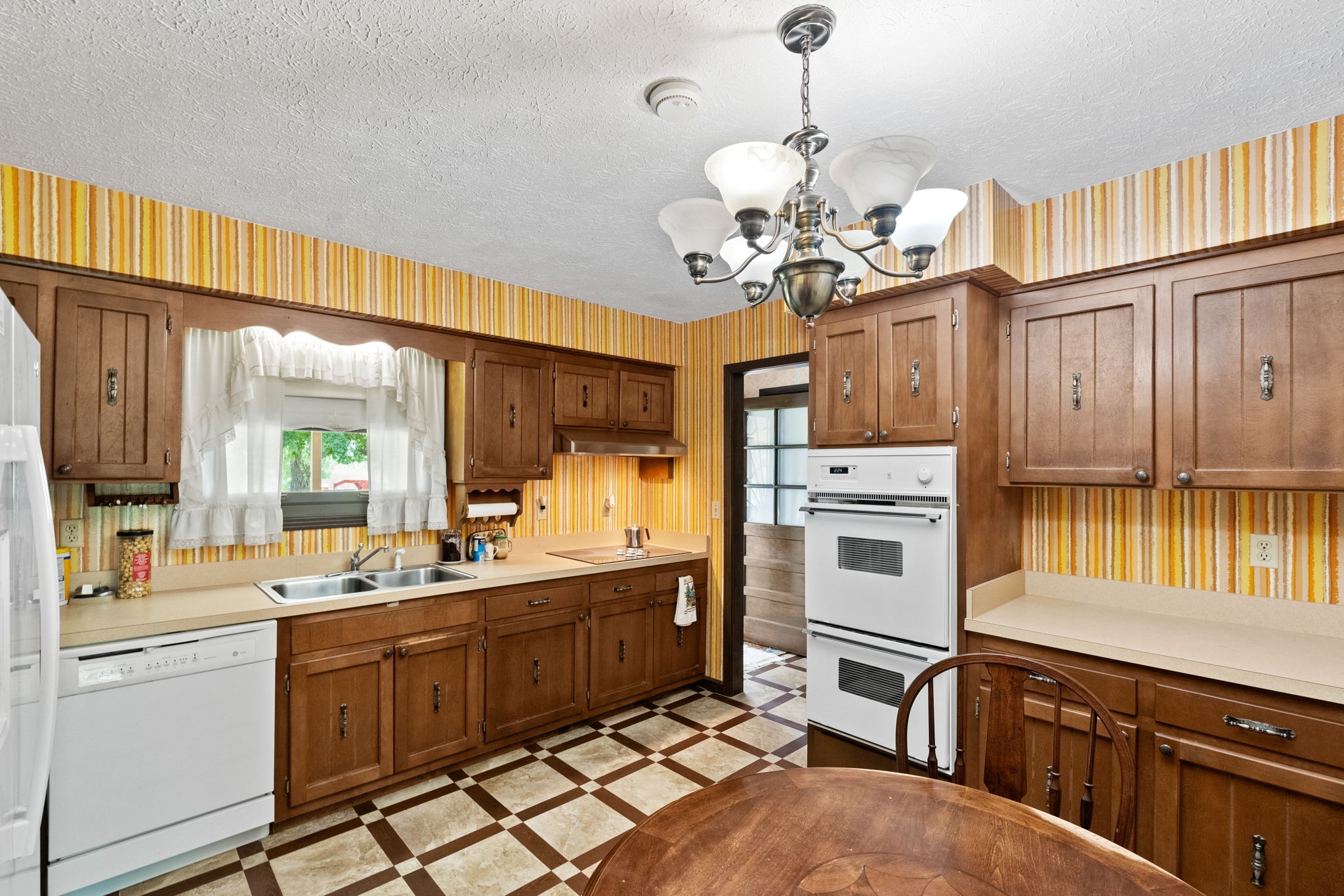 141 Jernigan Road Portland, TN 37148 - Photo 23 of 24 a kitchen with a sink stove and cabinets