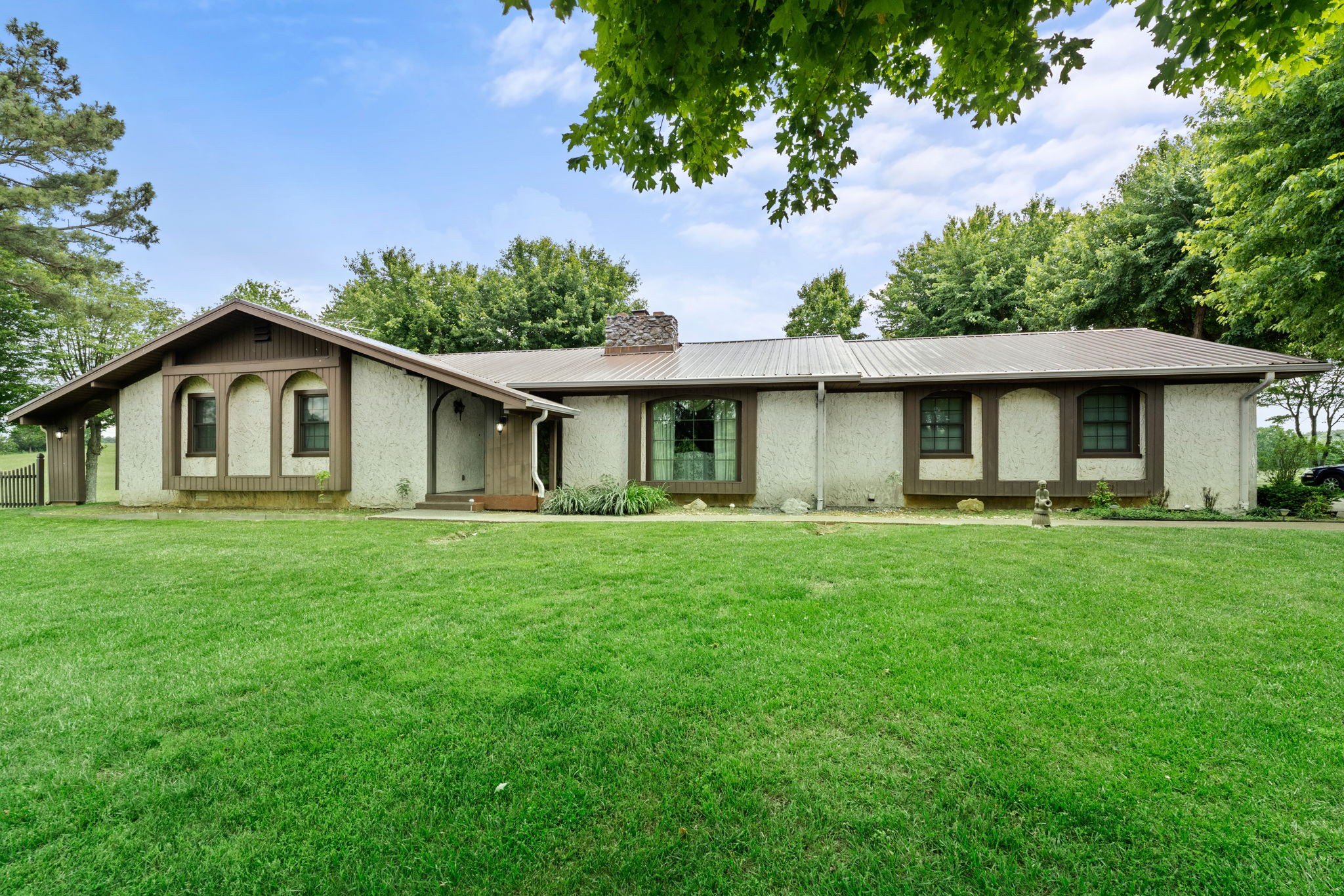 141 Jernigan Road Portland, TN 37148 - Photo 7 of 24 a view of a house with a yard