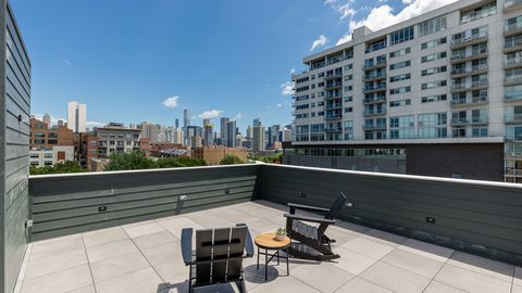 729 North Sangamon Street, Unit 303 Chicago, IL 60642 - Photo 15 of 16 a view of balcony with city view