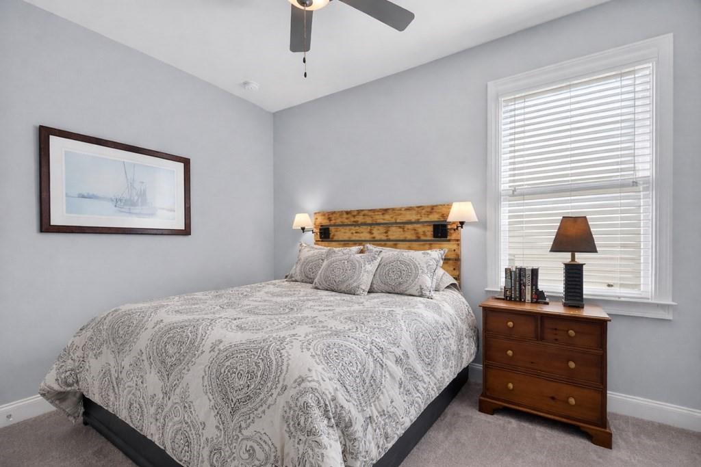 24 Teton Trail Jasper, GA 30143 - Photo 25 of 41 a bedroom with a bed and wooden floor