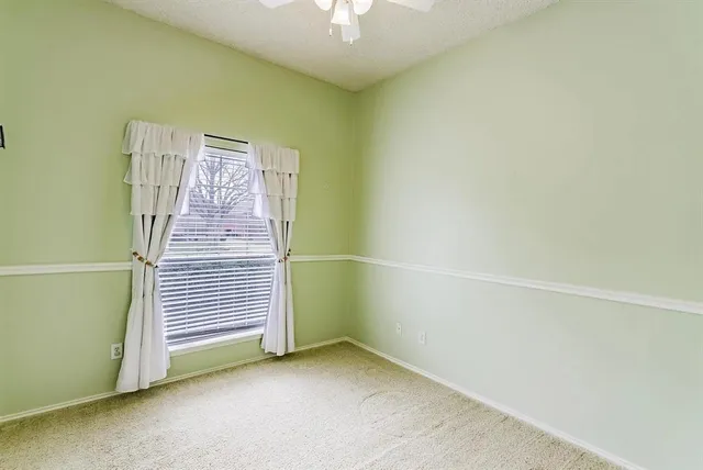 a view of a room with staircase