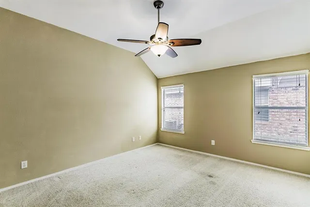 a view of a room with windows