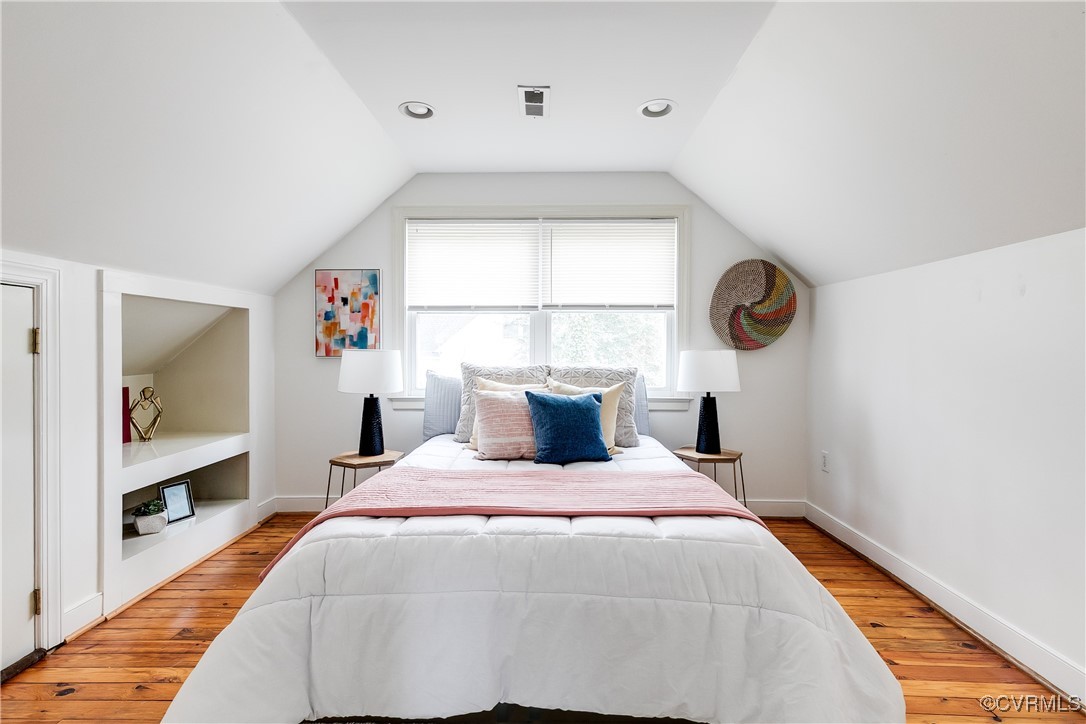 8941 Elm Road Richmond, VA 23235 - Photo 21 of 35 a bedroom with a bed and a window