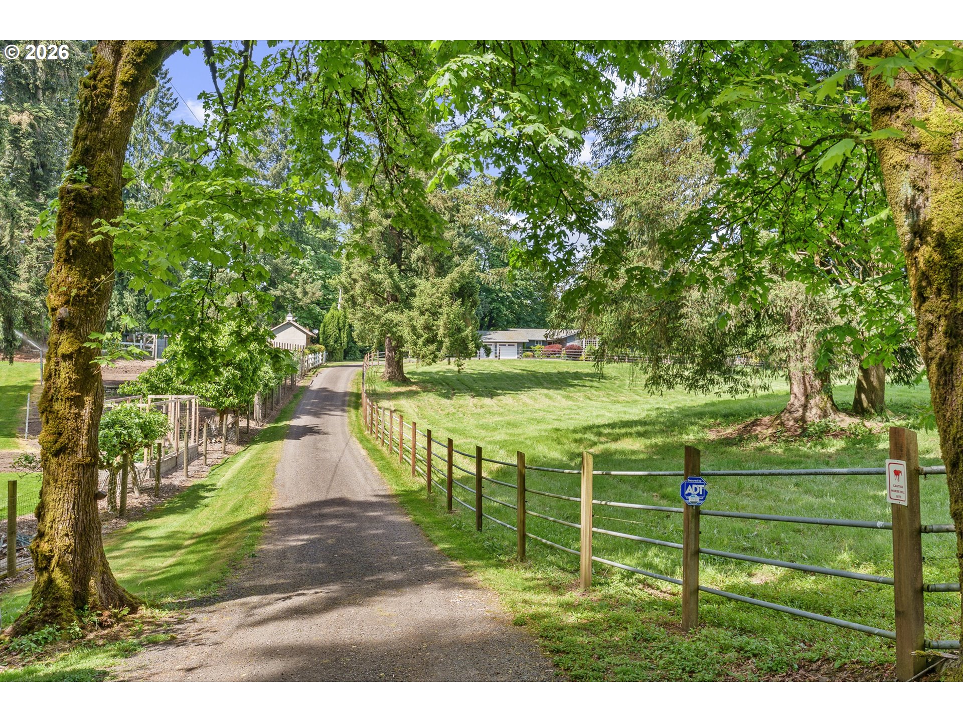 12737 Northeast Cedarbrook Road Aurora, OR 97002 - Photo 2 of 48 a view of a park with swings