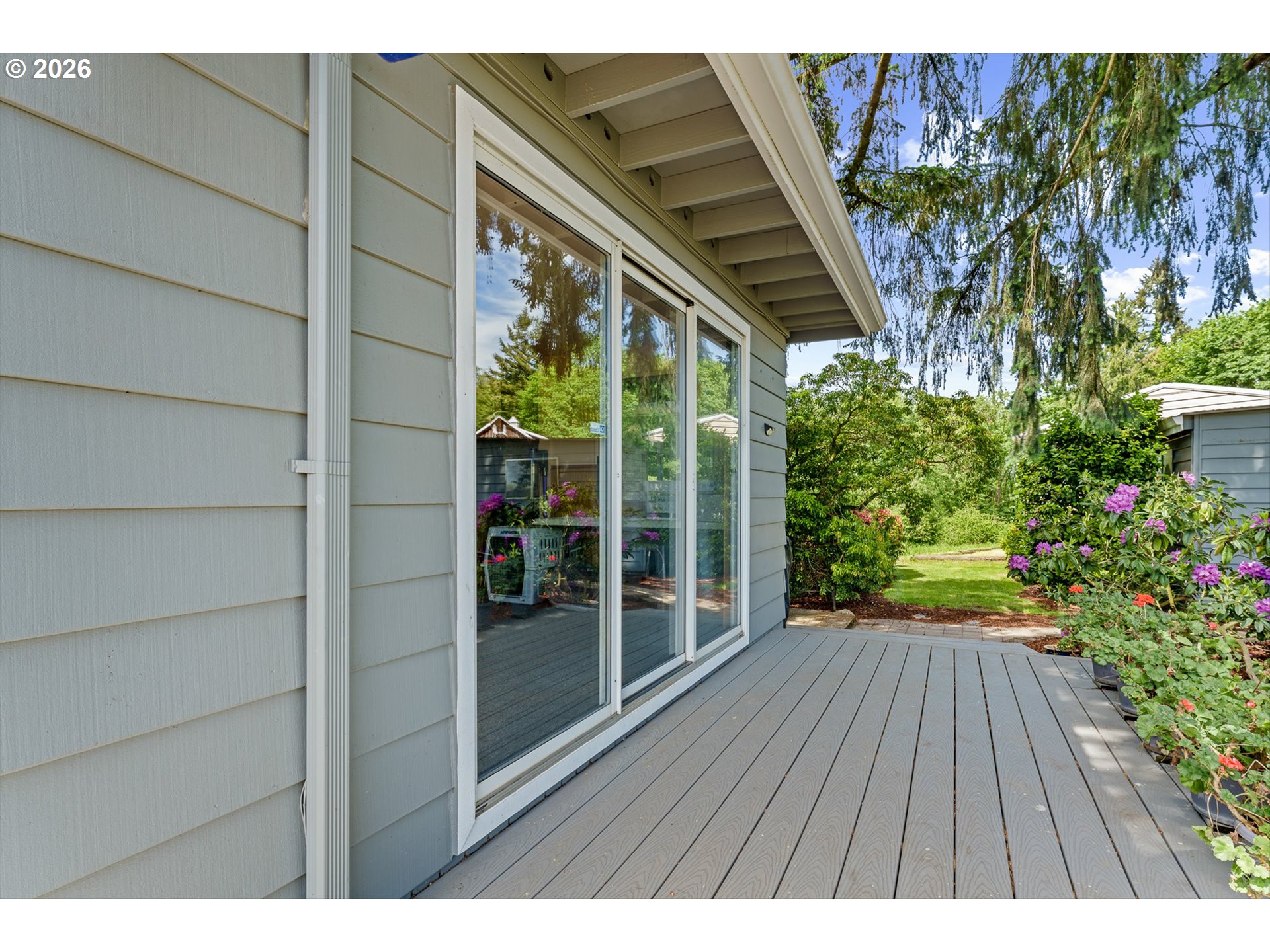 12737 Northeast Cedarbrook Road Aurora, OR 97002 - Photo 30 of 48 a balcony with wooden floor
