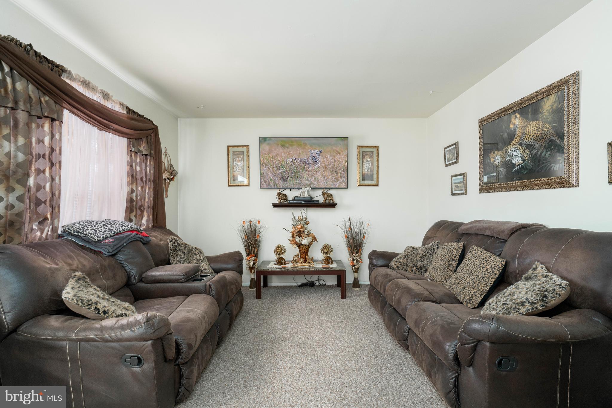 24 Magnolia Court Sicklerville, NJ 08081 - Photo 3 of 22 a living room with furniture and a couch