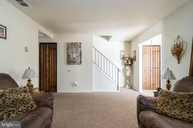 a kitchen with stainless steel appliances a stove a sink dishwasher and cabinets