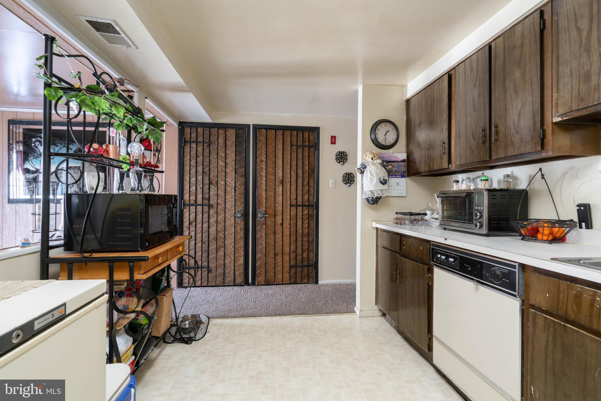 24 Magnolia Court Sicklerville, NJ 08081 - Photo 6 of 22 a kitchen with stainless steel appliances a stove a refrigerator and a sink