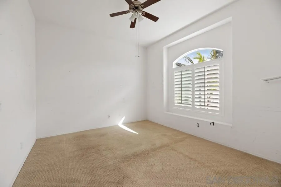 15076 Eastvale Road Poway, CA 92064 - Photo 15 of 35 an empty room with a window