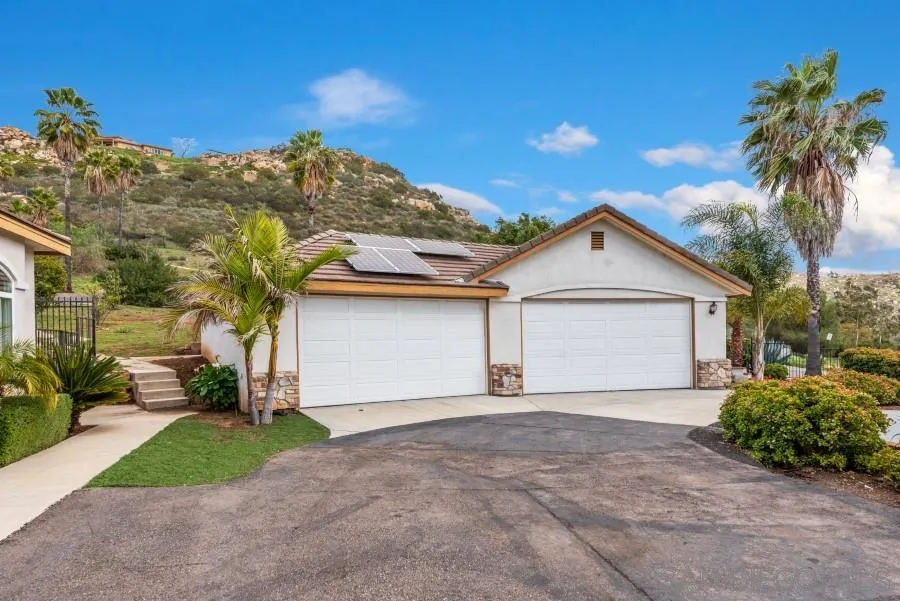 15076 Eastvale Road Poway, CA 92064 - Photo 3 of 35 a view of garage and yard