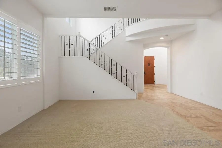 15076 Eastvale Road Poway, CA 92064 - Photo 6 of 35 a view of room and stairs