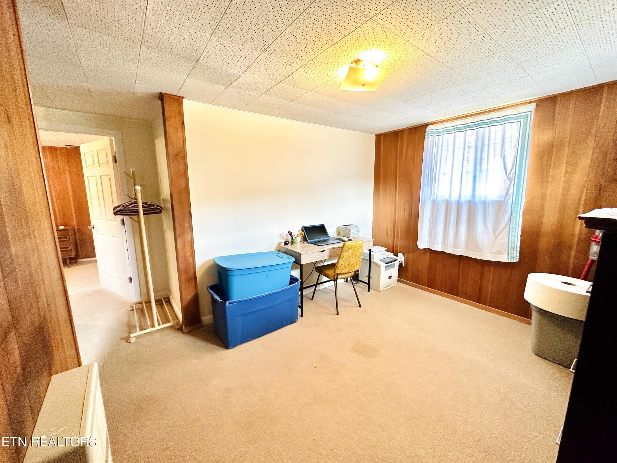 4428 Royalview Road Knoxville, TN 37921 - Photo 15 of 18 a bedroom with furniture and a large window