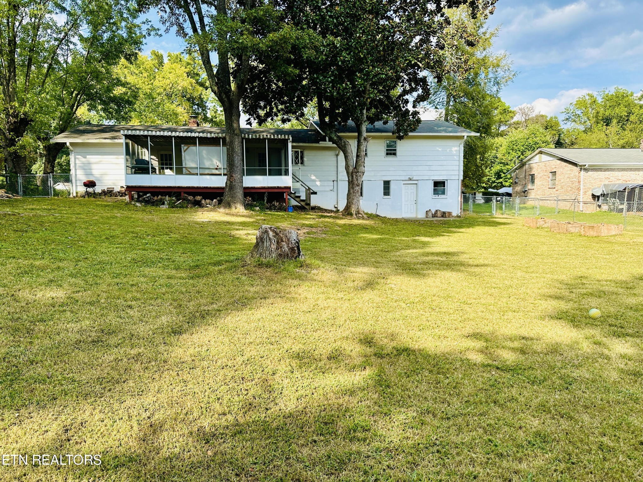 4428 Royalview Road Knoxville, TN 37921 - Photo 18 of 18 a front view of house with yard swimming pool and outdoor seating