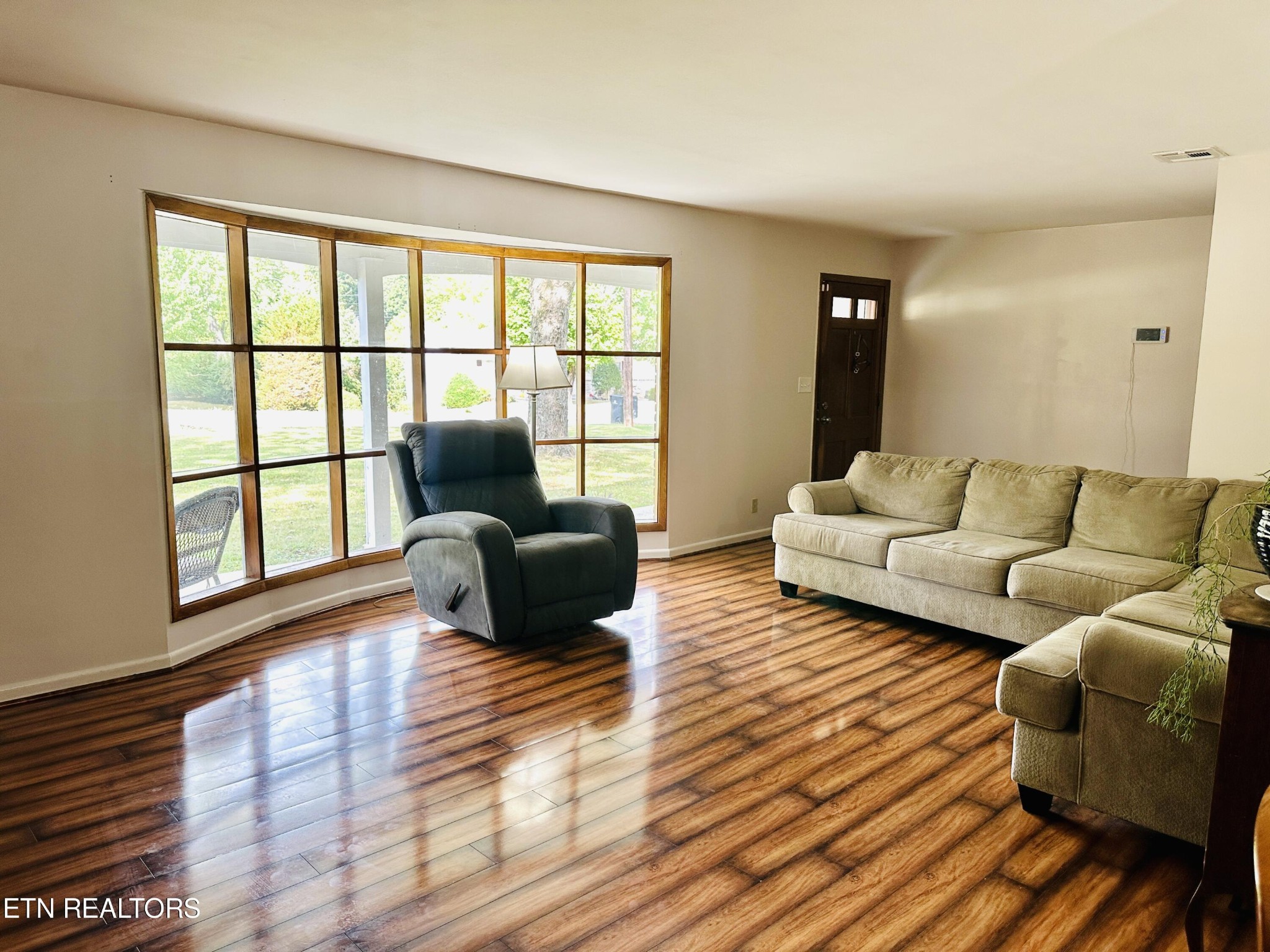 4428 Royalview Road Knoxville, TN 37921 - Photo 3 of 18 a living room with furniture and a large window