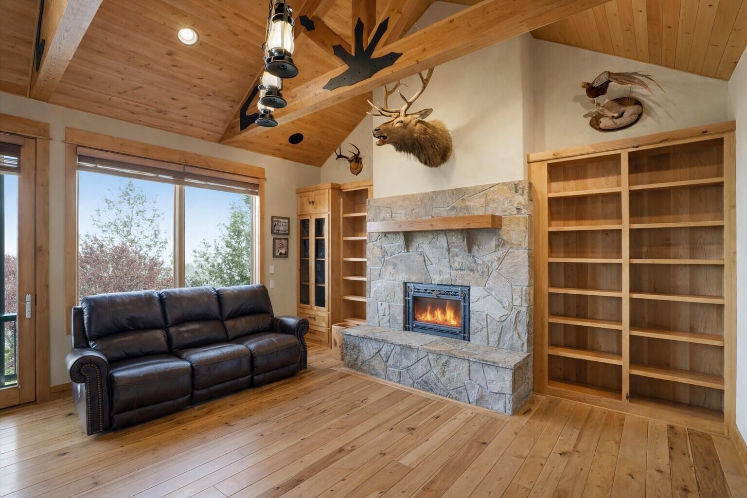 631 Sundance Ridge Court Redmond, OR 97756 - Photo 35 of 61 a living room with furniture and a fireplace