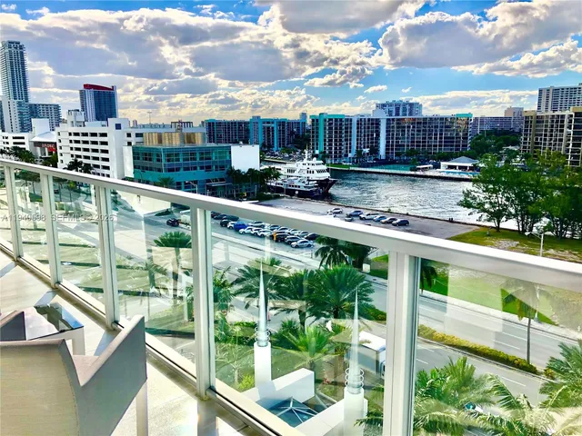 a view of swimming pool from a balcony